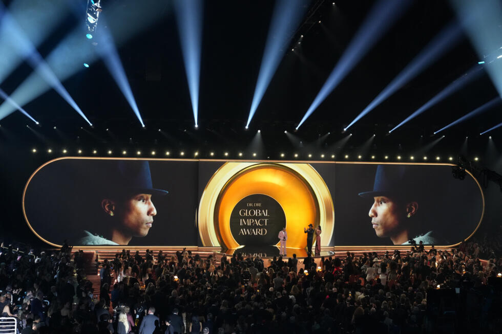 Pharrell Williams accepts the Dr. Dre Global Impact award to during the 68th annual Grammy Awards on Sunday, Feb. 1, 2026