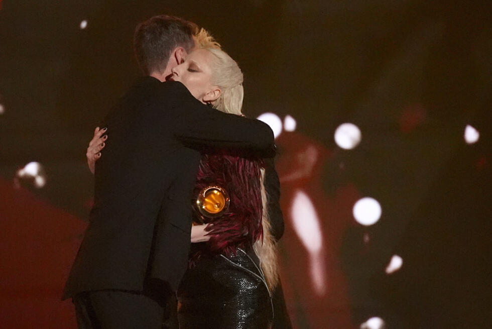 Cirkut and Lady Gaga embrace after accepting the award for best pop vocal album for "Mayhem" during the 68th annual Grammy Awards on Sunday, Feb. 1, 2026