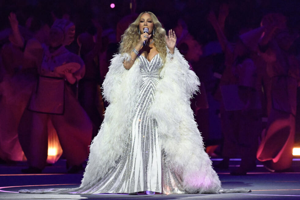US singer Mariah Carey performs during the opening ceremony of the Milano Cortina 2026 Winter Olympic Games at the San Siro stadium in Milan, northern Italy, on February 6, 2026. 