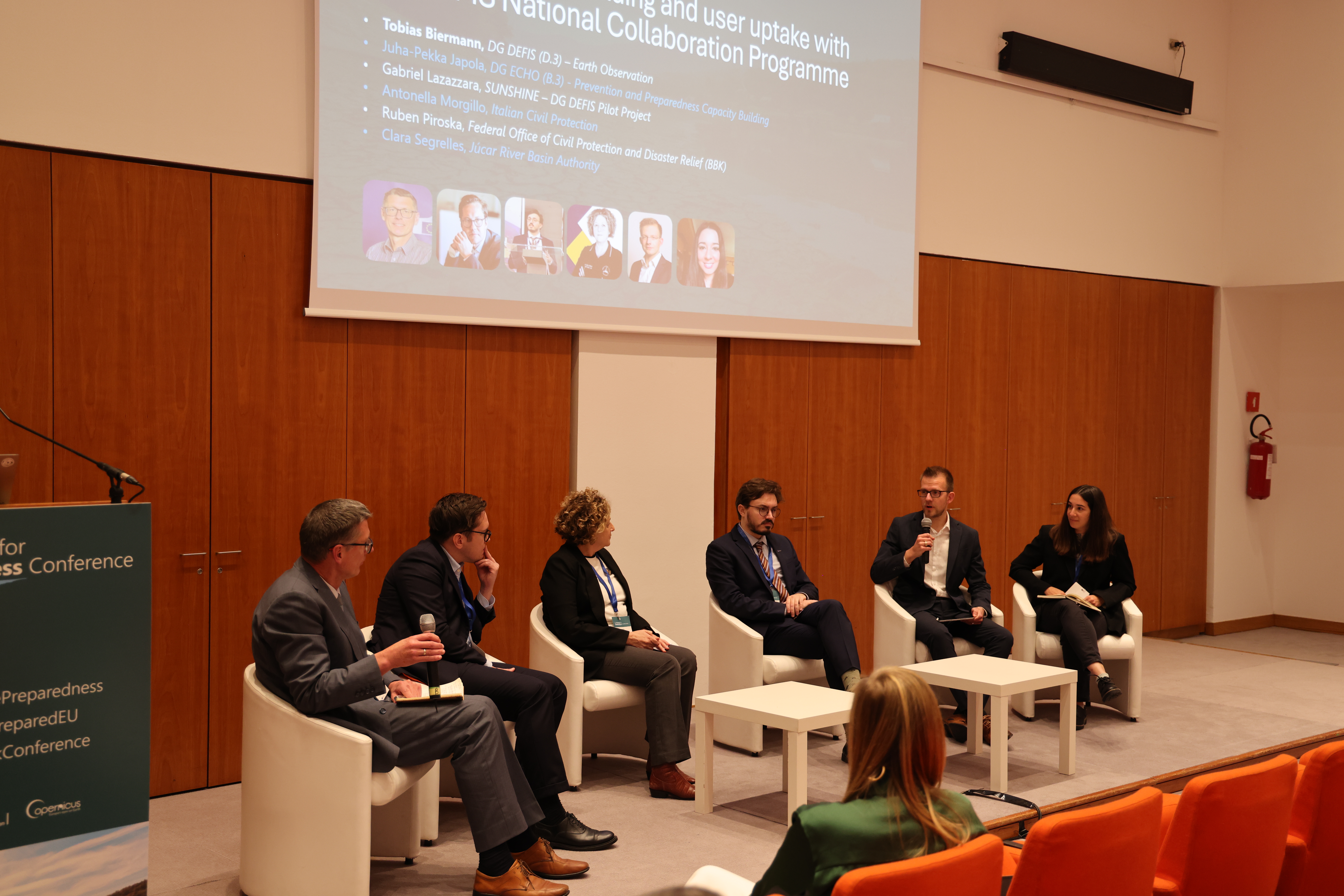 Panel discussion highlighting the need for stronger skills, knowledge sharing, and user engagement across the disaster management community,