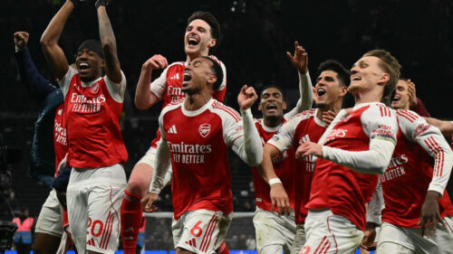 Premier League: Arsenal pass derby test of nerve against Tottenham