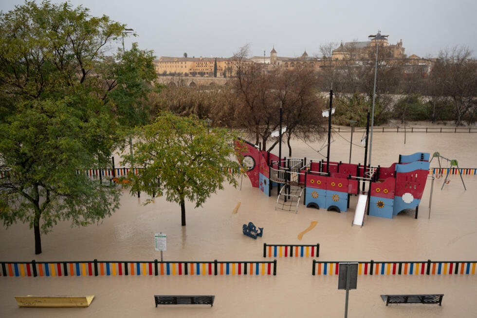 A flooded children's playground near the Guadalquivir River in Cordoba.