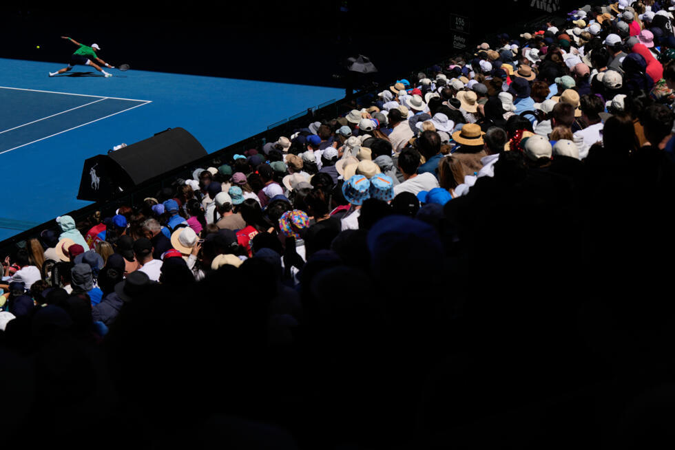 Novak Djokovic plays a backhand return to Francesco Maestrelli of Italy during their second round match at the Australian Open in Melbourne on January 22.