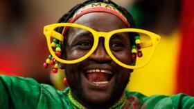 A Mali soccer fan waits for the start of the African Cup of Nations Group A soccer match between Morocco and Mali in Rabat, December 26, 2025