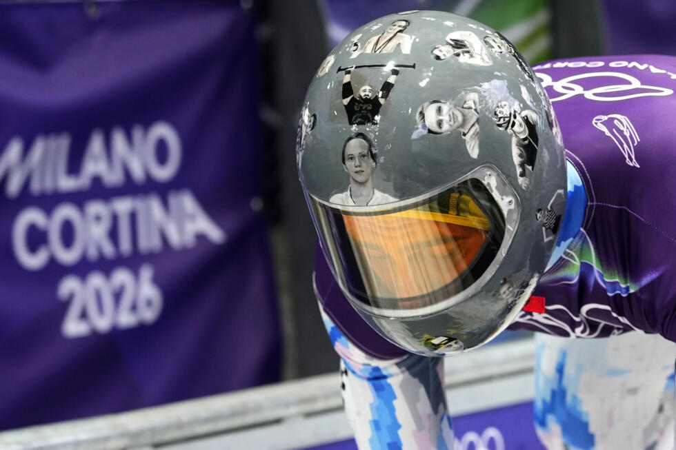 Ukraine's Vladyslav Heraskevych arrives at the finish during a men's skeleton training session at the 2026 Winter Olympics in Cortina d'Ampezzo on February 10, 2026.