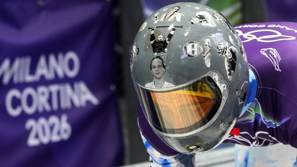 Ukraine's Vladyslav Heraskevych arrives at the finish during a men's skeleton training session at the 2026 Winter Olympics, in Cortina d'Ampezzo, Italy, Tuesday, Feb. 10, 2026.