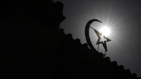 The star and crescent can be seen over the Grande Mosquée de Paris in the French capital, on September 9, 2025. The Muslim holy month of Ramadan runs from February 18-19 to March 19, 2026