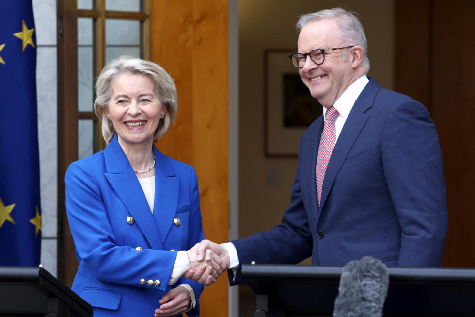 Australian Prime Minister Anthony Albanese and European Commission President Ursula von der Leyen shake hands during a joint press conference at Parliament House in Canberra on March 24, 2026
