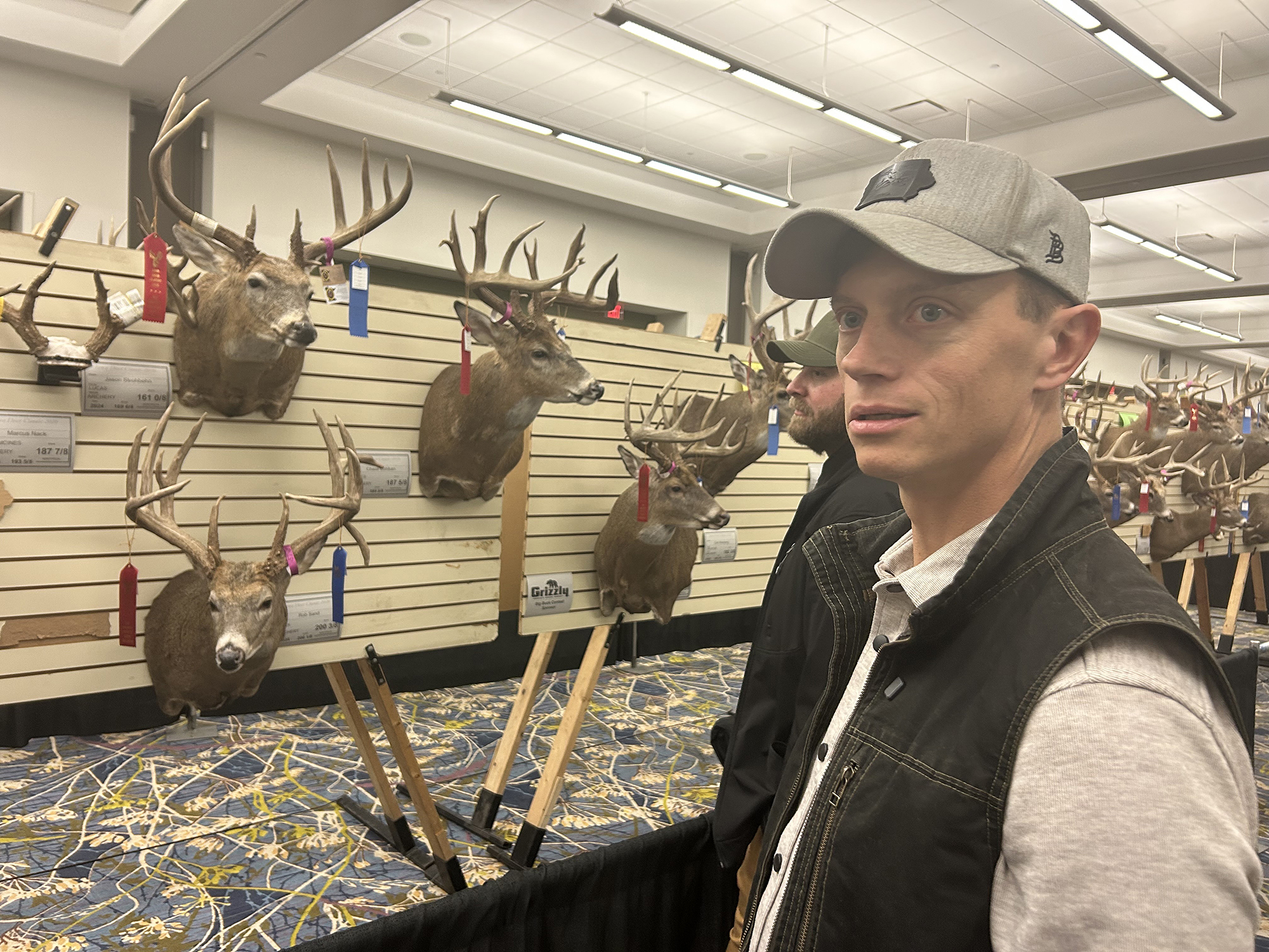 Rob Sand at the Iowa Deer Classic with his buck mount 