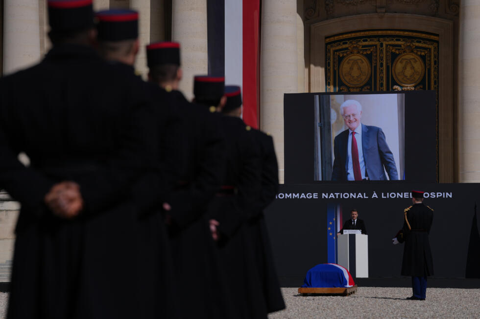 French President Emmanuel Macron delivers a speech during a national homage ceremony to late French prime minister Lionel Jospin at the Invalides monument, in Paris.