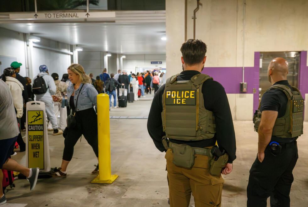 U.S. Immigration and Customs Enforcement (ICE) agents patrol Louis Armstrong International Airport (MSY) in Kenner, La.