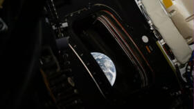 An image of Earth taken by NASA's Artemis II astronaut commander Reid Wiseman inside the Orion capsule on April 3, 2026.