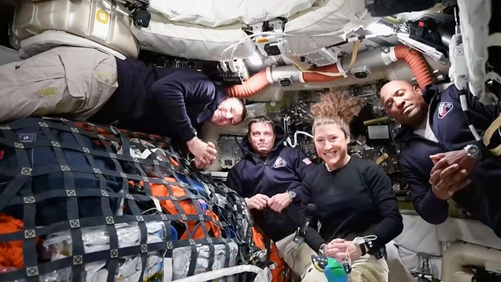 This image from video provided by NASA shows the Artemis II crew, from left, Canadian astronaut and mission specialist Jeremy Hansen, Commander Reid Wiseman, mission specialist Christina Koch and pilo