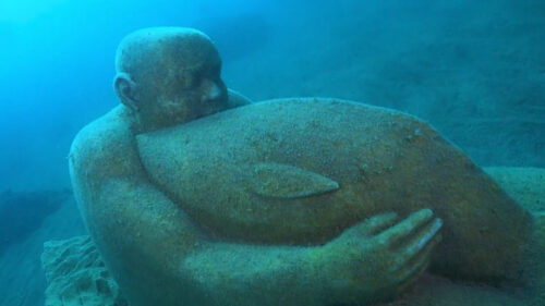 Giant marble statues guard Italy’s seas from illegal fishing