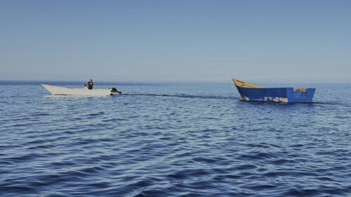 Two dead, dozens missing after migrant boat capsizes in Mediterranean