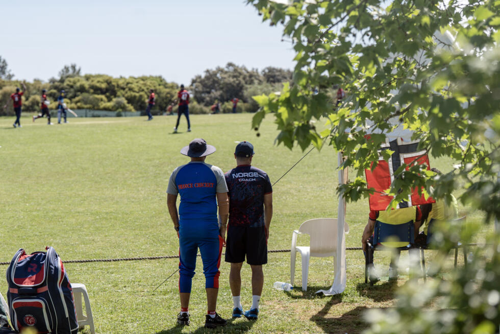 France Cricket and Norway coaches watch the action at Santarem Cricket Ground on April 5, 2026.