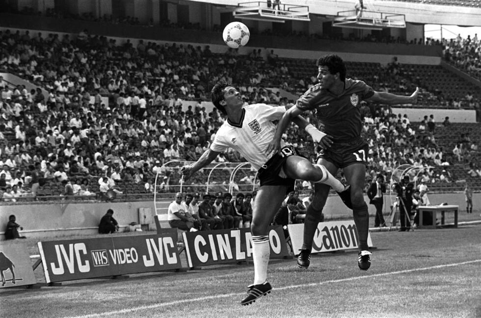 Gary Lineker of England (left) and Morocco's Khairi Abderrazak tussle for the ball in their 0-0 draw at the 1986 World Cup.