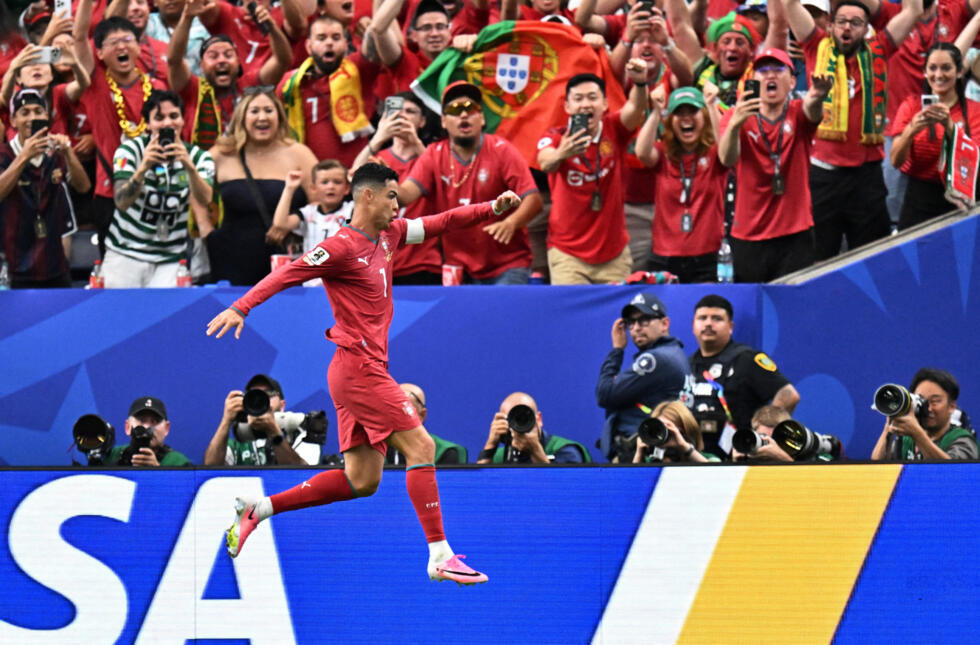 Portugal's Cristiano Ronaldo celebrates scoring their third goal against Uzbekistan.