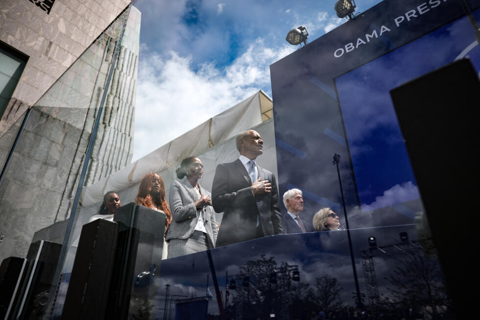 Former US president Barack Obama with his wife Michelle and daughters Sasha and Malia attends the dedication ceremony for the opening of the Barack Obama Presidential Center in Chicago on June 18