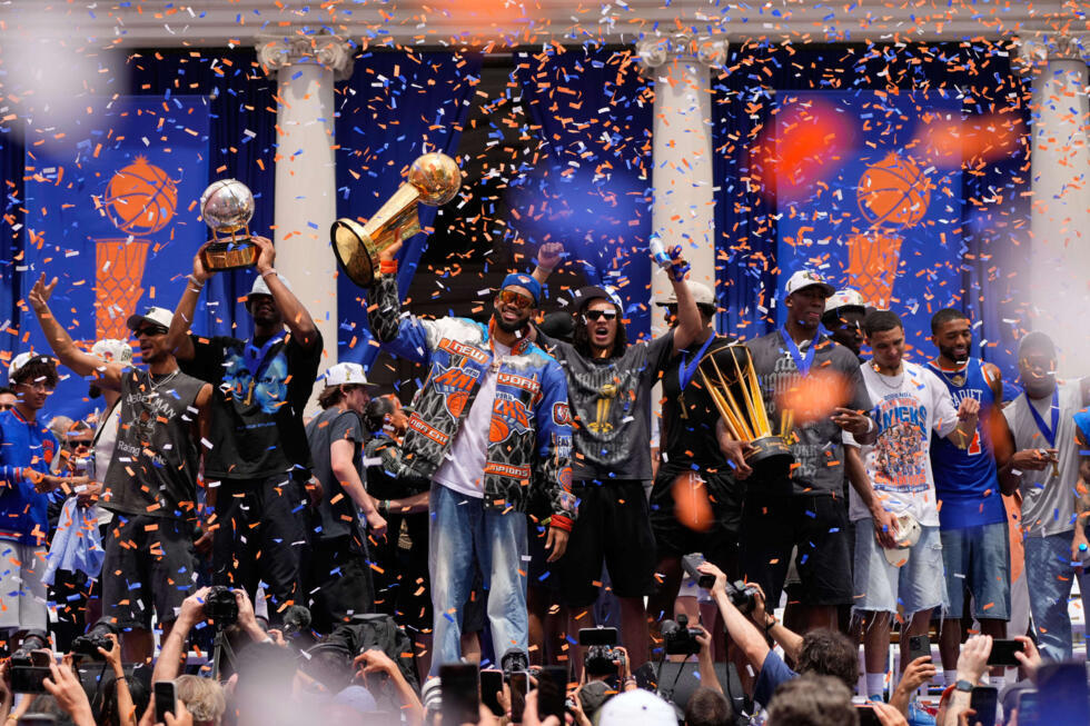 Players celebrate during the New York Knicks' NBA championship ceremony at City Hall in New York on June 18